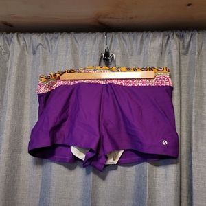 N for Next purple printed board shorts